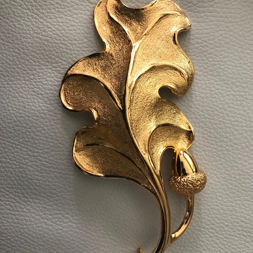 CHRISTOPHER ROSS LEAF BUCKLE